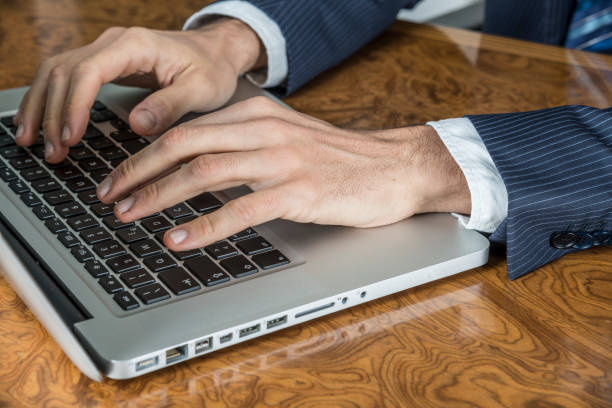 istock young businessman in his office using laptop 1299236164