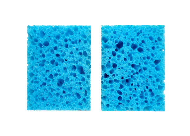 istock Blue rectangular porous washing sponges top view isolated on a white background 1299240449