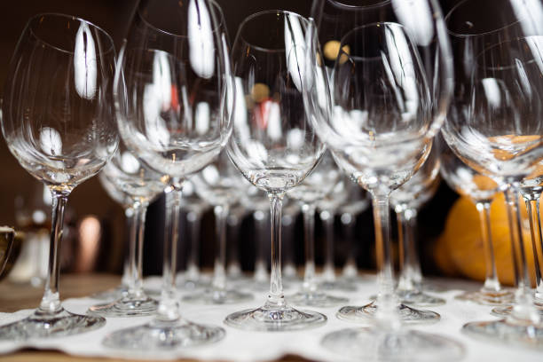 istock Wine glasses on a bar counter in restaurant 1299242089