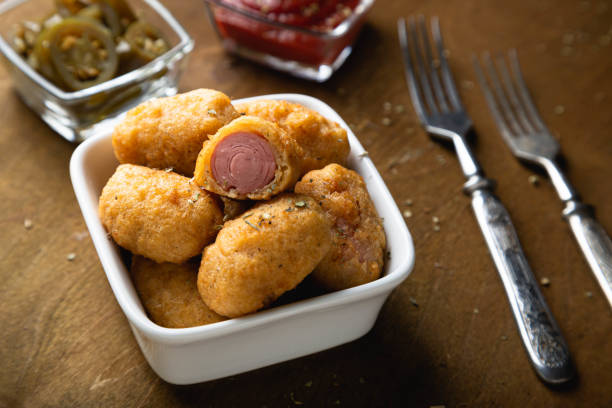istock Mini corn dog with ketchup and jalapeno pepper 1299244434