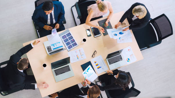 istock Business people group meeting shot from top view 1299245845