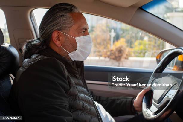 A Taxi Driver Cares His Customers Health Wearing Mask Is Obligatory Now Stock Photo - Download Image Now