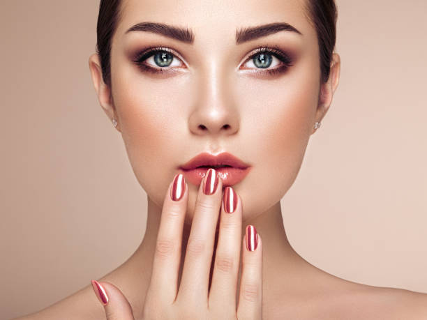 istock Beauty brunette woman with perfect makeup 1299251852