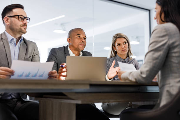 istock Human resource team having a job interview with their candidate. 1299259860