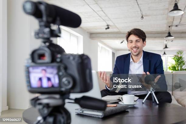 Businessman Making A Video Blog In The Office Stock Photo - Download Image Now - Influencer, Finance, Filming