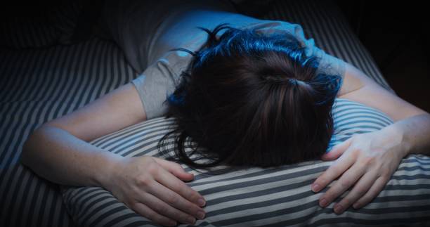 istock Mature woman is having insomnia in bed 1299261967