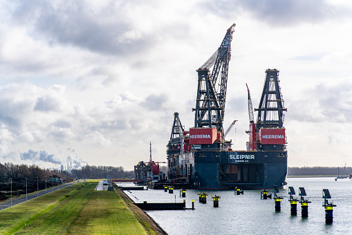 ROTTERDAM, NETHERLANDS - JANUARY 22, 2021: Heerema Marine Contractors' semi-submersible crane vessel Thialf is waiting for maintenance in the port of Rotterdam.