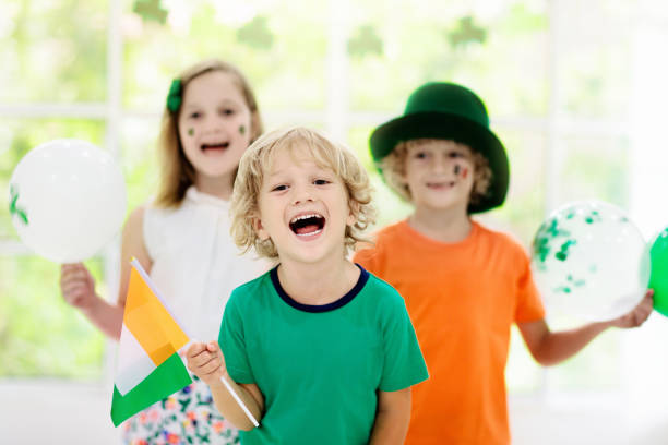 istock Kids celebrate St Patrick Day. Irish holiday. 1299266481