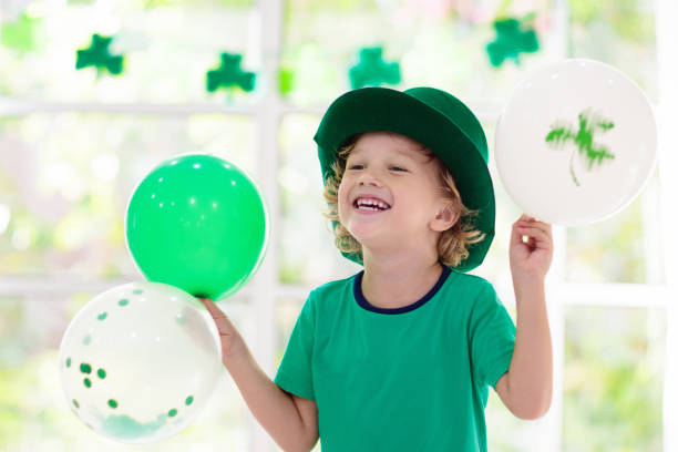 istock Kids celebrate St Patrick Day. Irish holiday. 1299266552