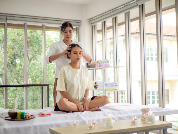 istock A beautiful girl happiness in spa with Thai massage 1299266785