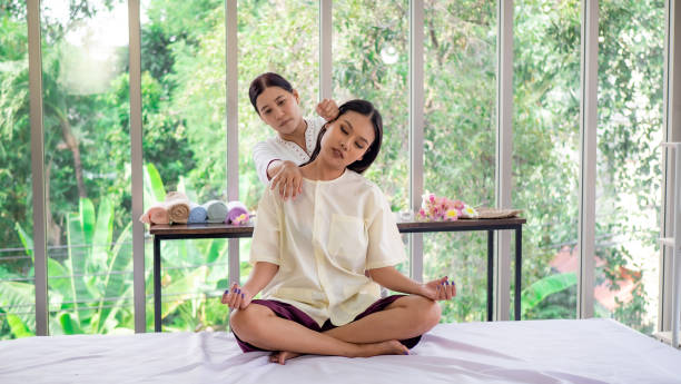istock A beautiful girl happiness in spa with Thai massage 1299266794
