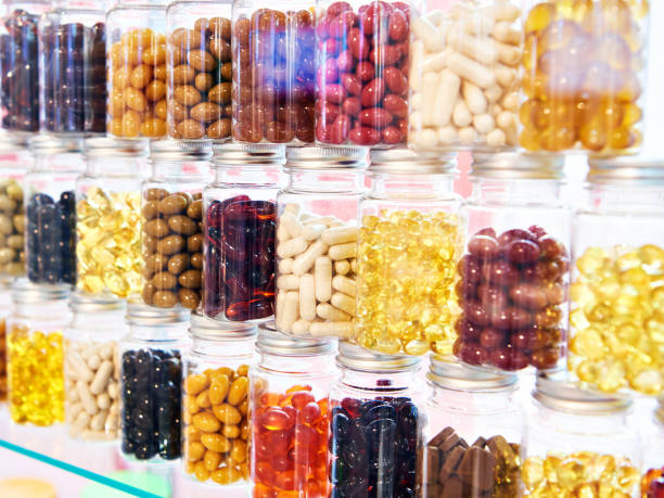 istock Capsules dietary supplements in pharmacy store 1299269405