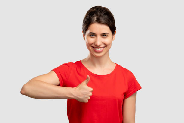 istock like gesture supporting sign happy woman thumb up 1299274935