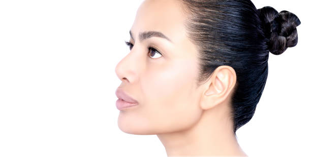 istock Before and after Healing and removing spot melasma pigmentation facial treatment. Problem of facial skin on middle age beauty Asia woman skin Cosmetology therapy concept. Headshot isolated on white. 1299275630