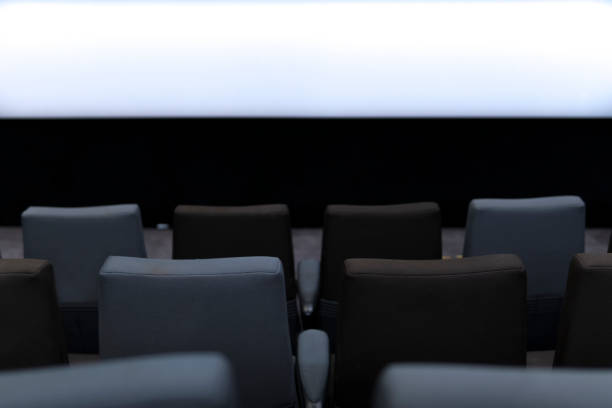 istock Empty comfortable seats with numbers in cinema 1299278857