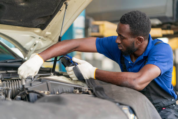 istock African mechanic working in the garage 1299285742