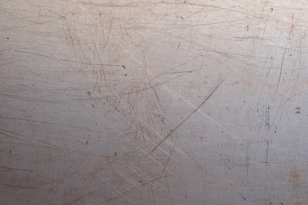 istock Scratched dirty copper plate texture, metal background. Old copper metal surface plate 1299286514
