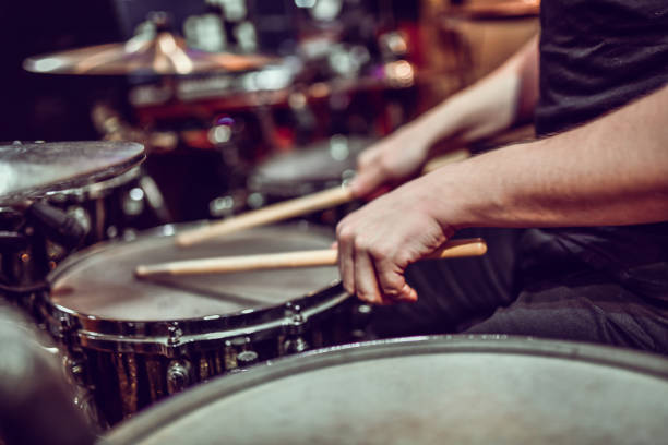 Drummer Practicing Snare Rudiments Drummer Practicing Snare Rudiments drummer hands stock pictures, royalty-free photos & images