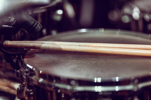 Drumsticks On A Snare Drum In Studio