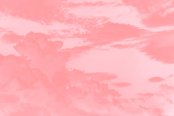 istock Abstract pastel pink coral soft color sky background with clouds 1299294619