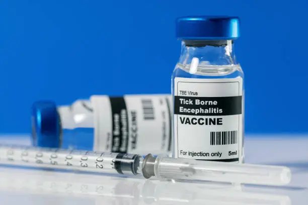 tick borne encephalitis TBE virus vaccine vials and syringe