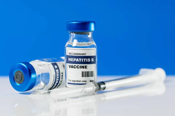 Photo of hepatitis b virus vaccine vials and syringe