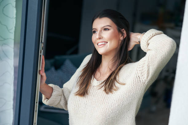 istock Young sexy woman relaxing at home 1299296330