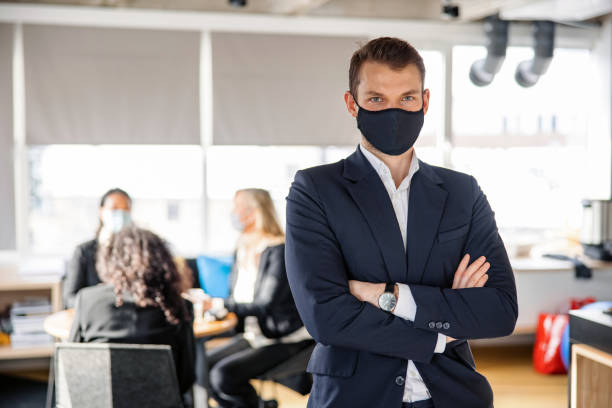 istock Caucasian Male Project Manager in Time of COVID-19 1299298917