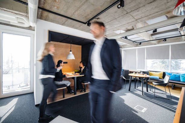istock Corporate Professionals on the Move and Meeting Face to Face 1299298969