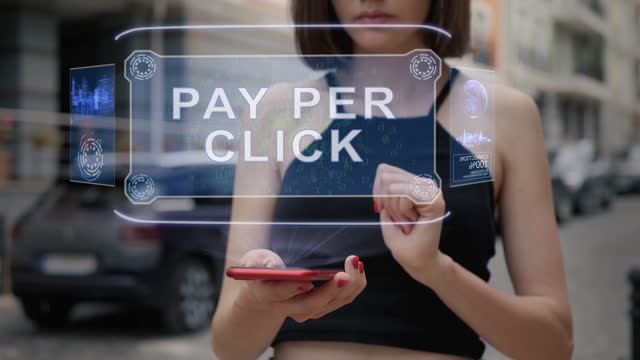 Young adult interacts hologram Pay per click