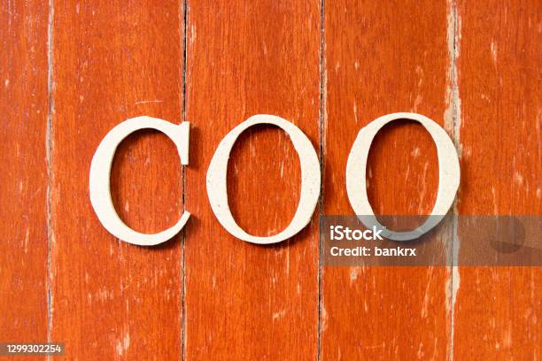 Alphabet Letter In Word Coo On Old Red Color Wood Plate Background Stock Photo - Download Image Now