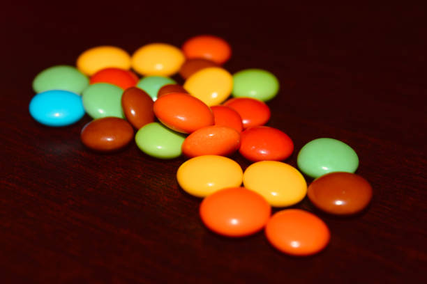 Colourful candy on a wooden surface unique photo