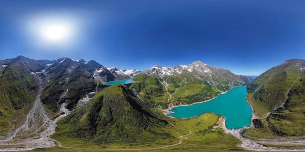 360x180 degree spherical (equirectangular) aerial panorama of Kaprun high mountain reservoirs Mooserboden Stausee and Wasserfallboden in the Hohe Tauern, Salzburger land, Austria. Spherical aerial panorama of Stausee Mooserboden Dam near Kaprun, Austria grossglockner stock pictures, royalty-free photos & images