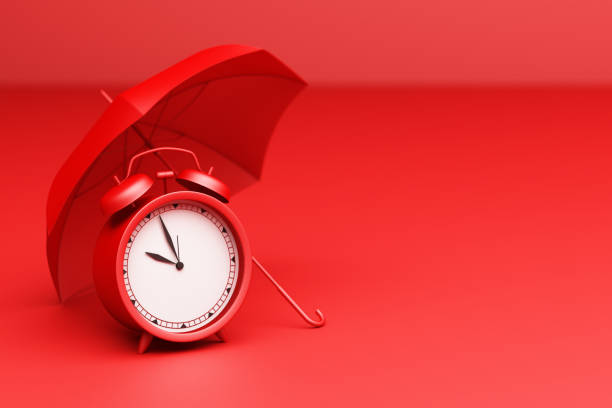 istock Red Alarm Clock with umbrella on a red background. 3d Rendering 1299305954