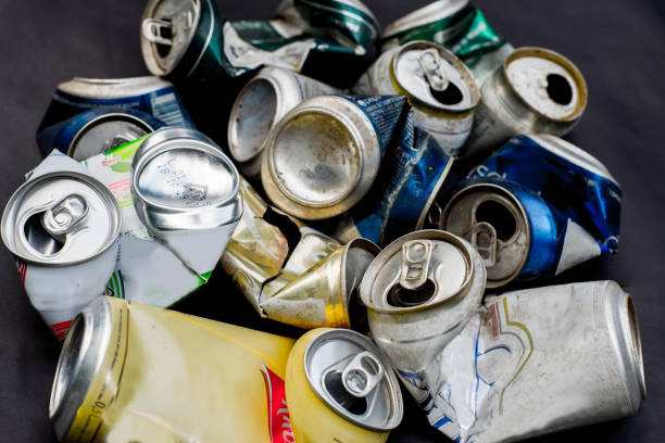 istock Heap of Used cans. Waste sorting and waste processing. Recyclable materials 1299307401