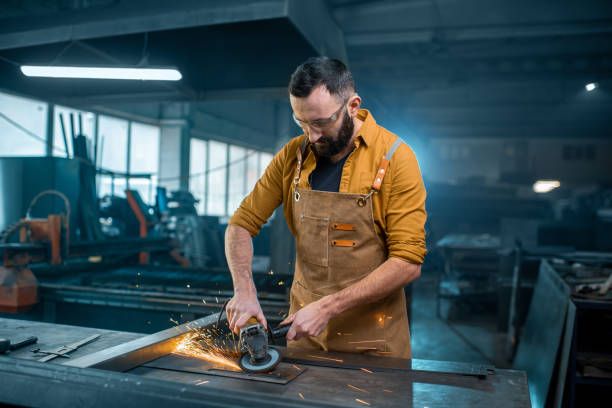 istock Metal industry worker at factory 1299309345