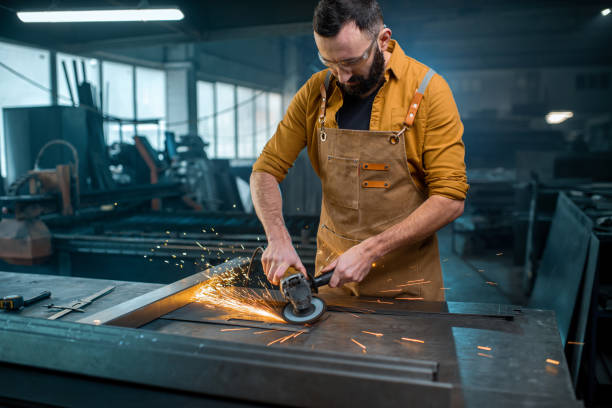 istock Metal industry worker at factory 1299310096