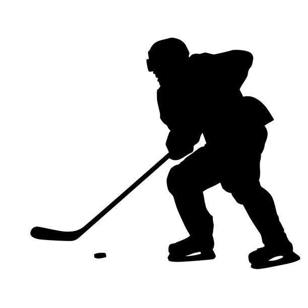 ilustrações, clipart, desenhos animados e ícones de jogador de hóquei no gelo patinando com disco, silhueta vetorial - ice hockey hockey puck speed ice