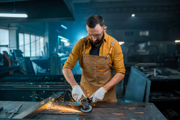 istock Metal industry worker at factory 1299313346
