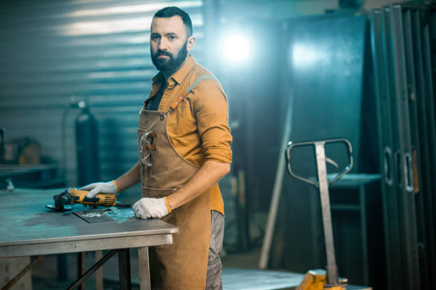 istock Man working with metal at the workshop 1299313834