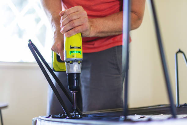 istock Assembly Using Cordless Power Drill Adult Working on Home Remodel Project Photo Series 1299313865