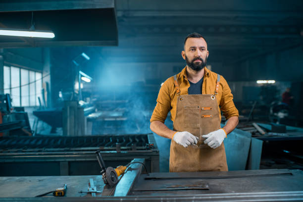 istock Metal industry worker at factory 1299316084