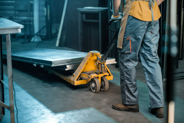 istock Metal industry worker working at the warehouse 1299316553
