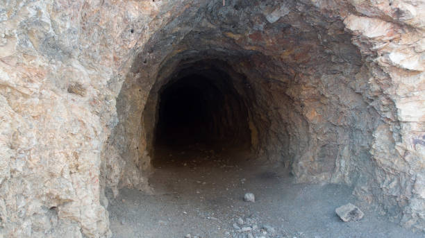 istock Entrance to an abandoned deep mine 1299318925