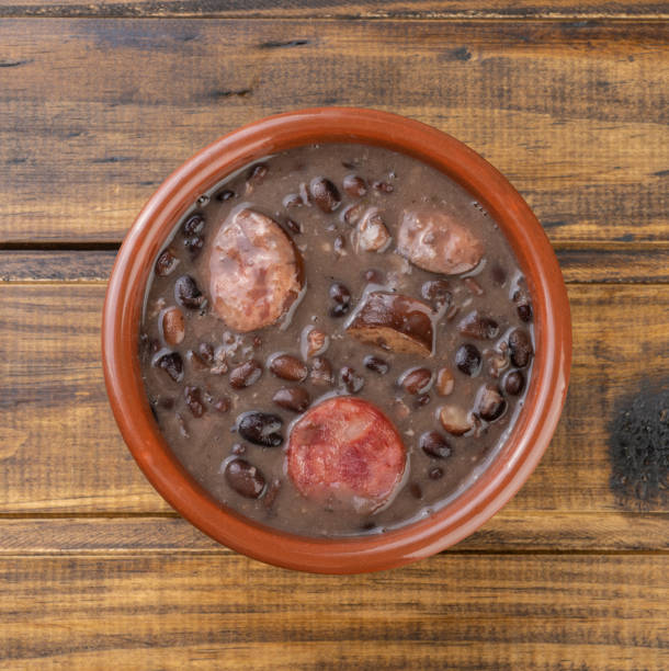 istock Traditional brazilian feijoada on a bowl over wooden table 1299320882