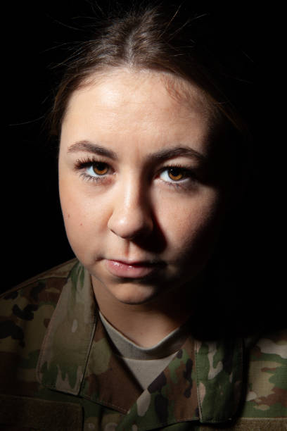 istock Dramatic Close Up of Female Soldier 1299322297