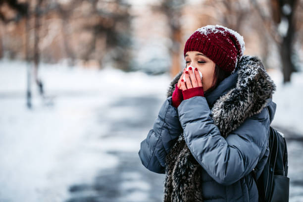 istock Woman blowing her nose 1299323256