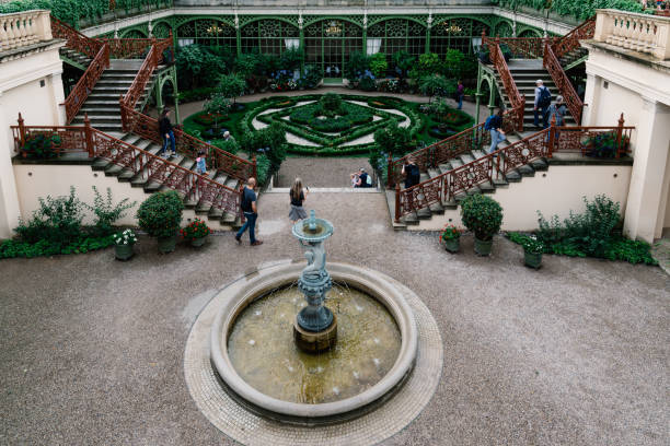 Schwerin, Germany - August 2, 2019: Garden with fountain in Schwerin Castle, one of the most important works of romantic Historicism in Europe
