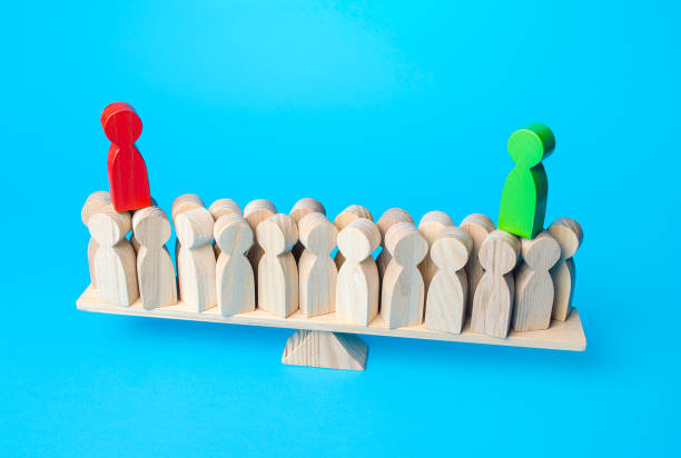 istock Two opposing persons in process of bringing people to their side on scales. Get the support of majority in competition. Democratic election campaign. Electorate. Political debate. 1299323643