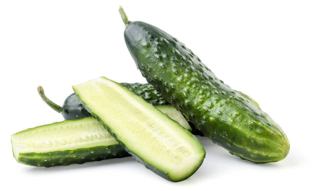 istock Fresh whole cucumber and half on a white background. Isolated 1299324436
